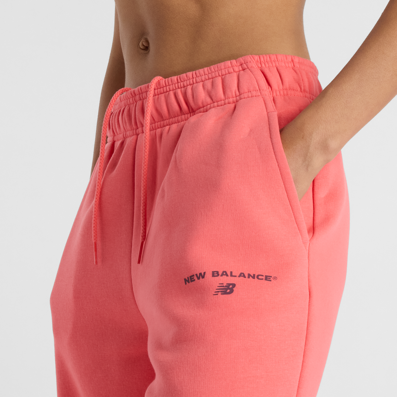 New Balance WP51500 Broek Reimagined Jogger Drift Pink